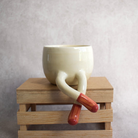 Maceta con piernas colgantes chica