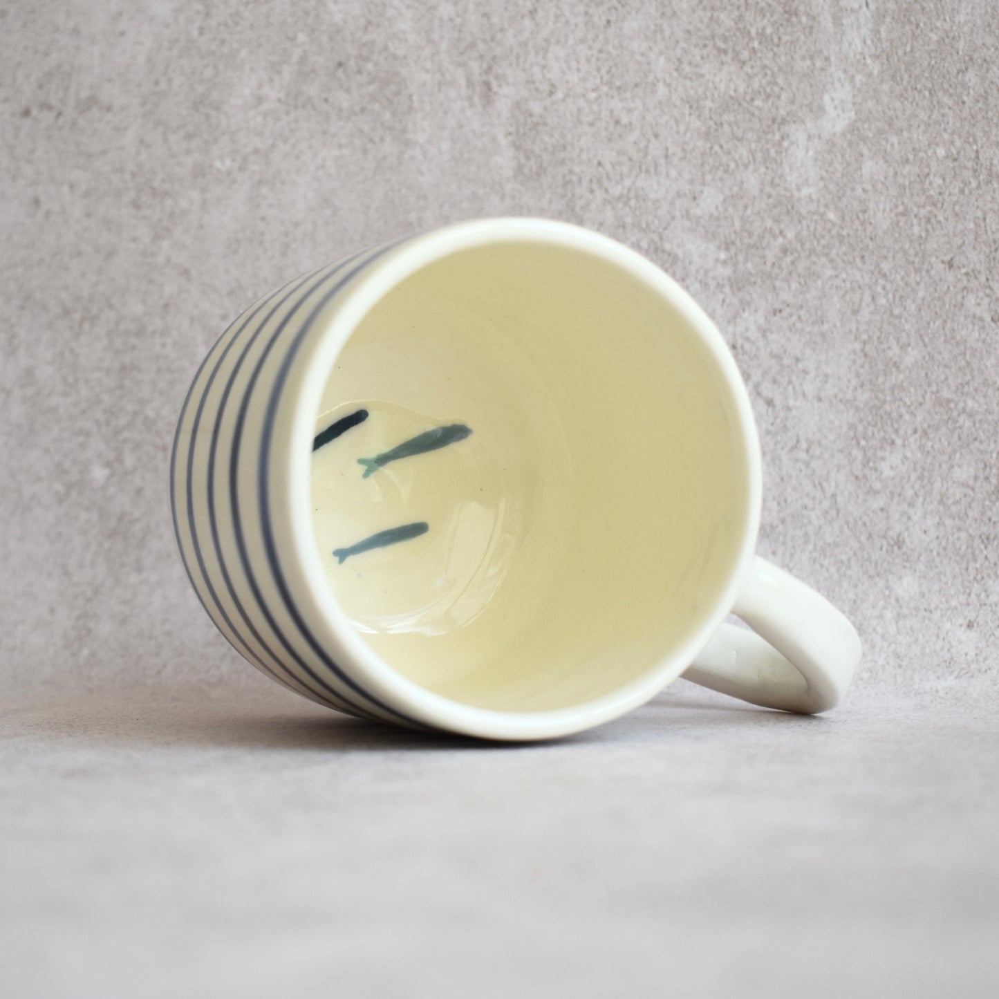 Taza rayas azules