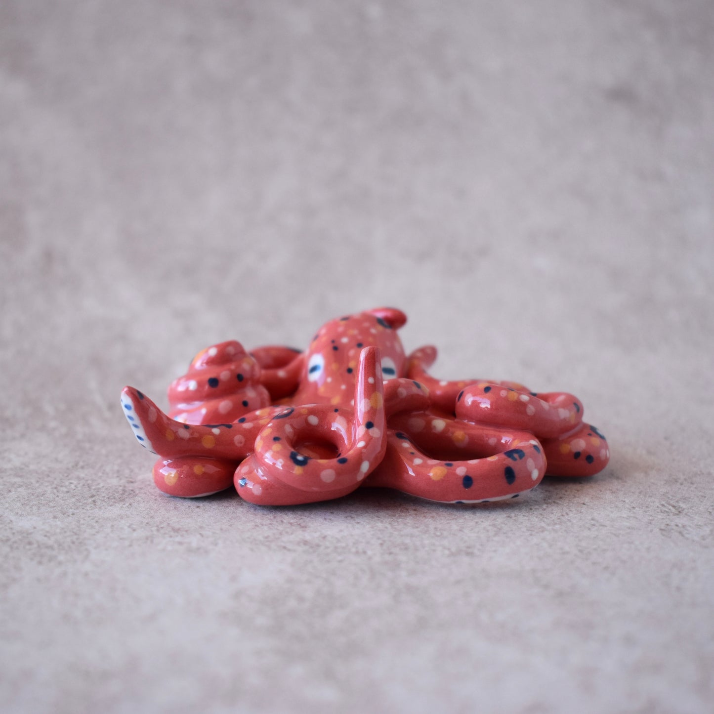 Pulpo portaincienso rojo