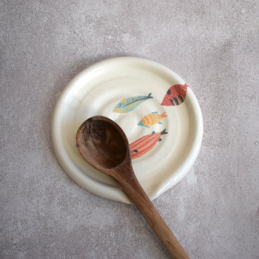 Descansa cuchara peces