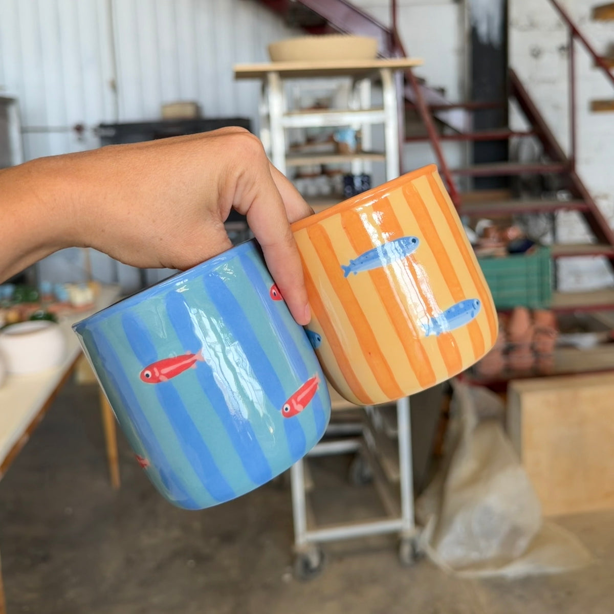 Vaso rayas y peces azul