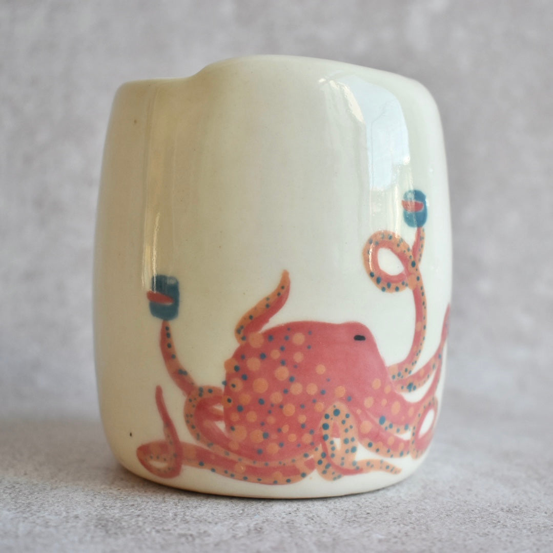 Taza de viaje con diseño de pulpo