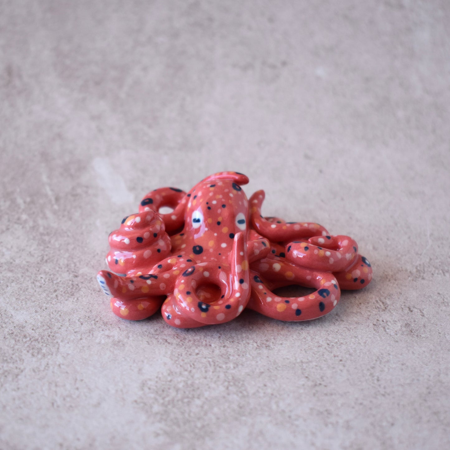 Pulpo portaincienso rojo